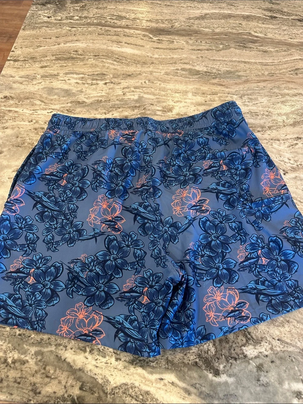 Huk Men’s Blue Floral Swim Trunks with Coral Drawstring